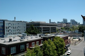 When we arrived in June, the space in the lower right hand corner of this view from our apartment window was vacant.
