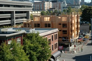 That same space is now a four-story structure nearing completion.